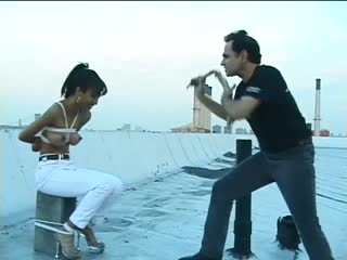 Asian slut gets herself whipped on the roof of a hotel